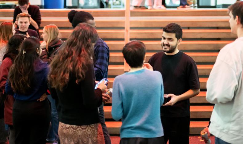 Students at a happy hour event.
